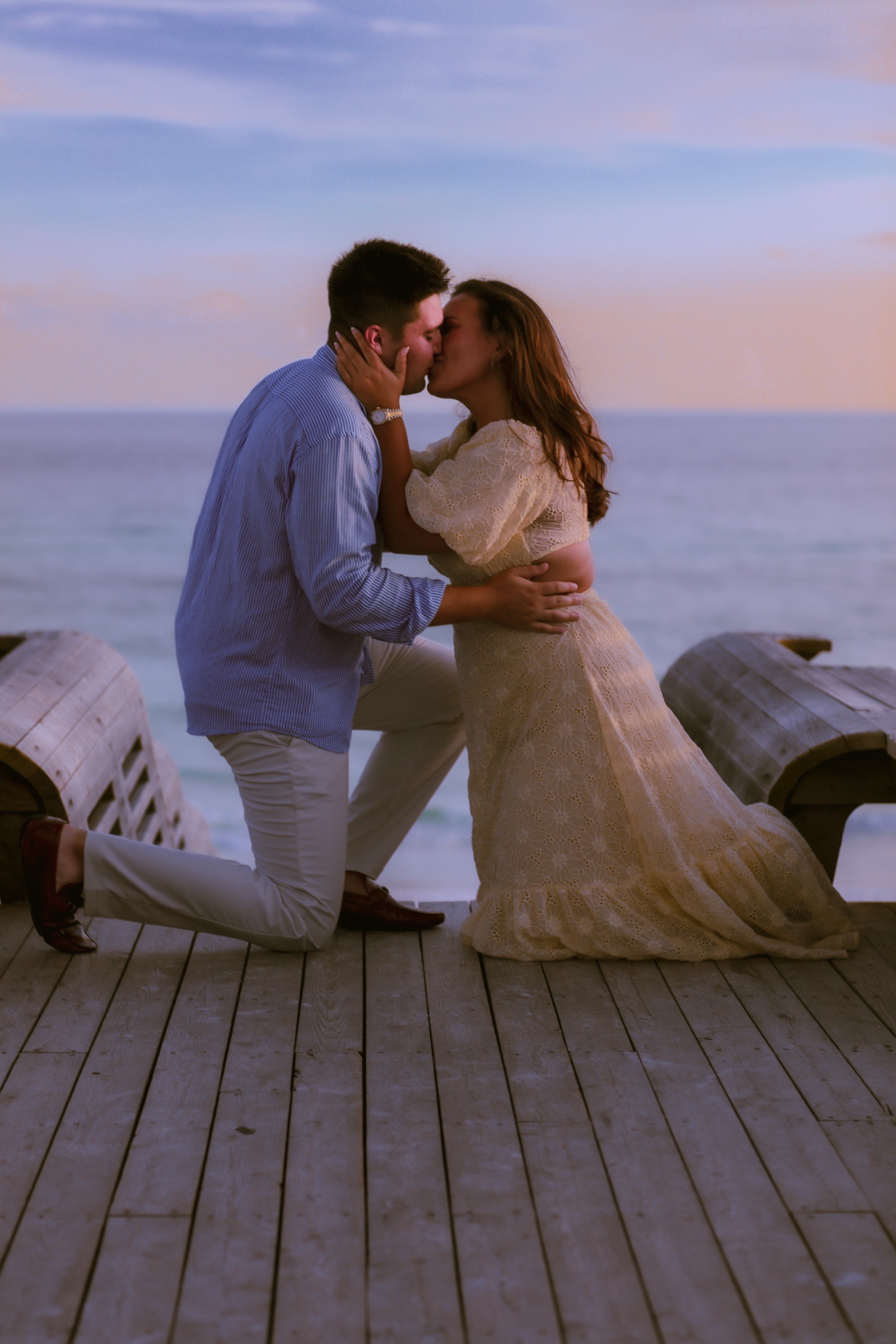 Engagement embrace at sunset on the beach, Emerald Coast
