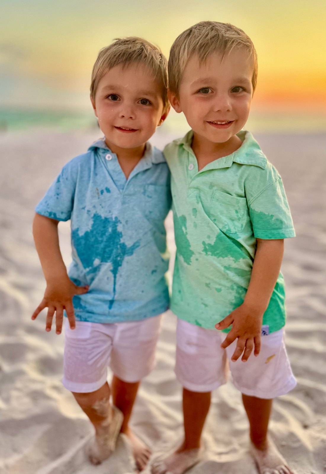Two young brothers at sunset on the beach, Panama City Beach