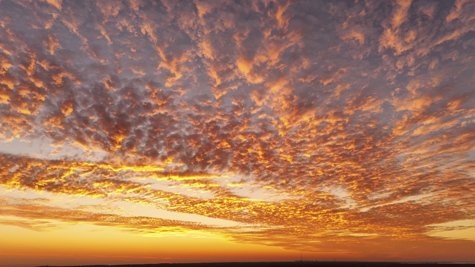 Aerial sunset with mackerel sky over the Gulf — Ed Gutentag